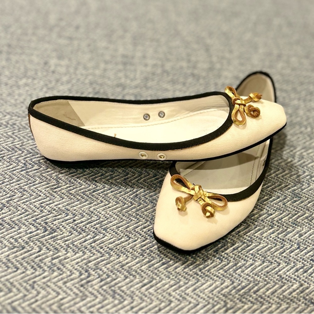 Yves Saint Laurent Cream Canvas Ballet Flats with Black Trim & Gold Bow